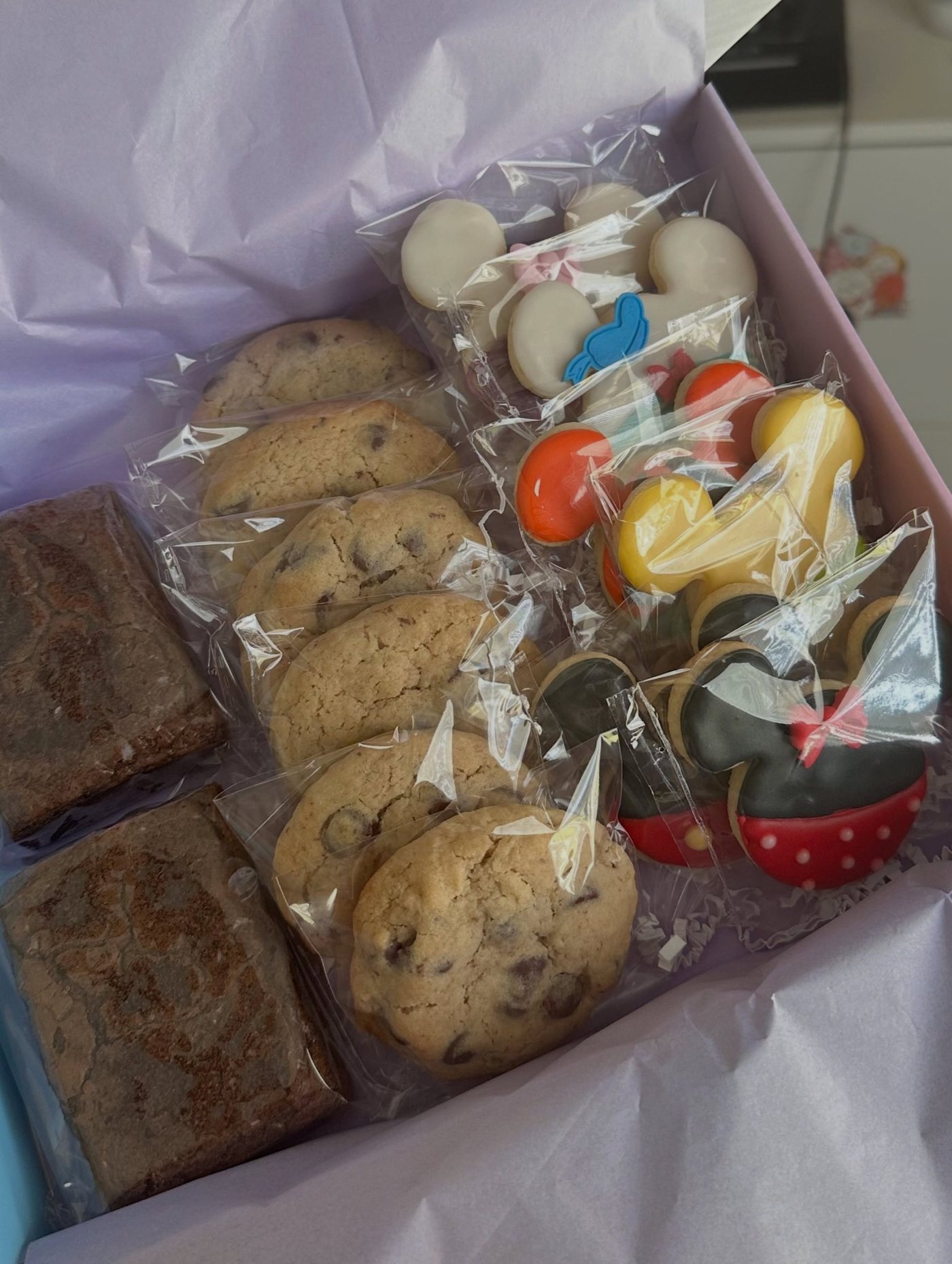 Travel agent treat box with brownies and cookies