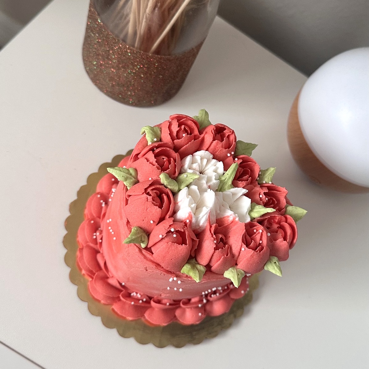 Coral floral buttercream cake