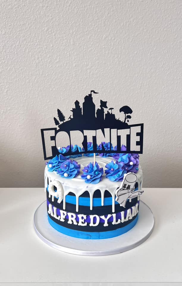 Fortnite themed blue drip cake