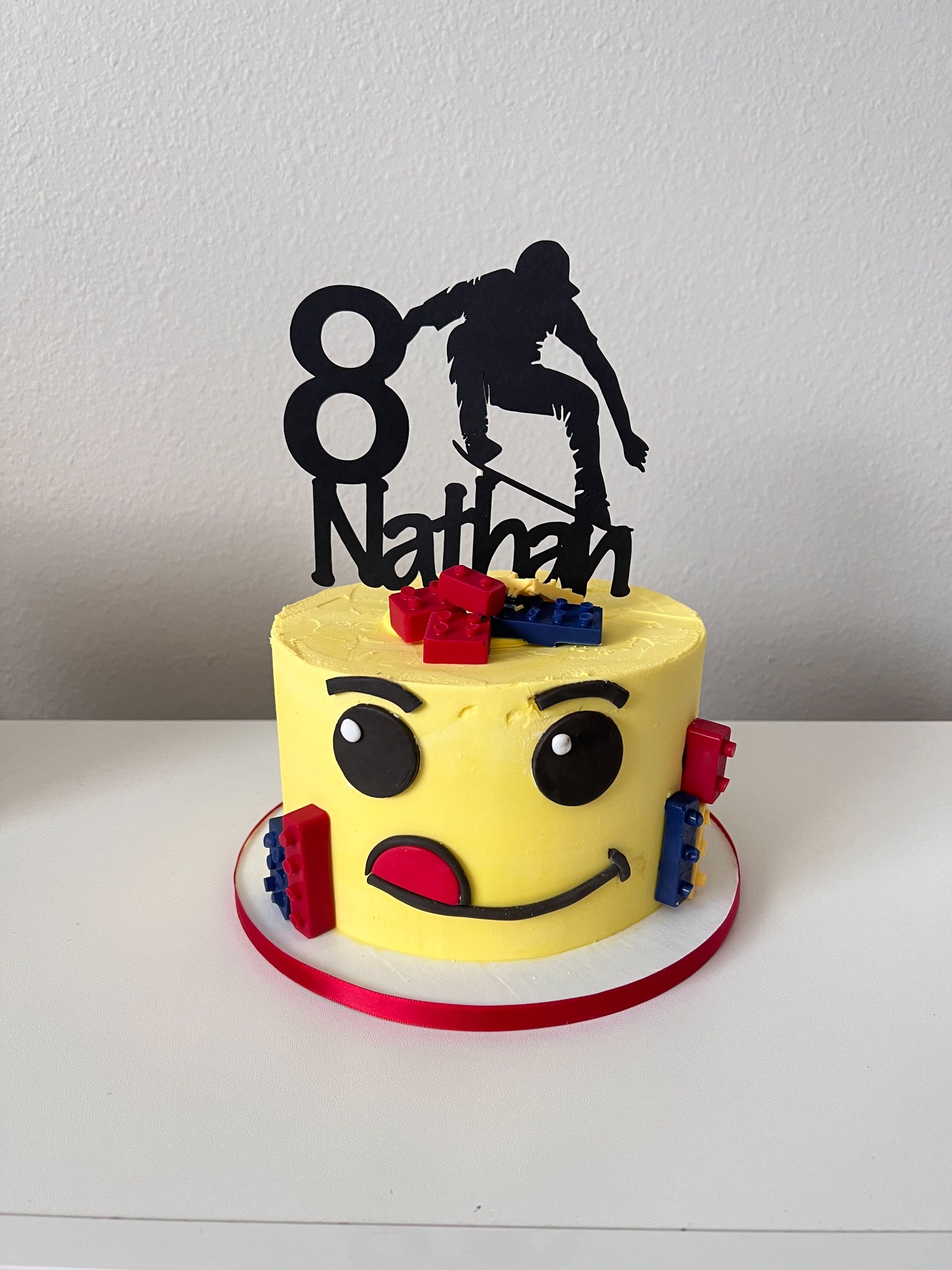 Lego face birthday cake