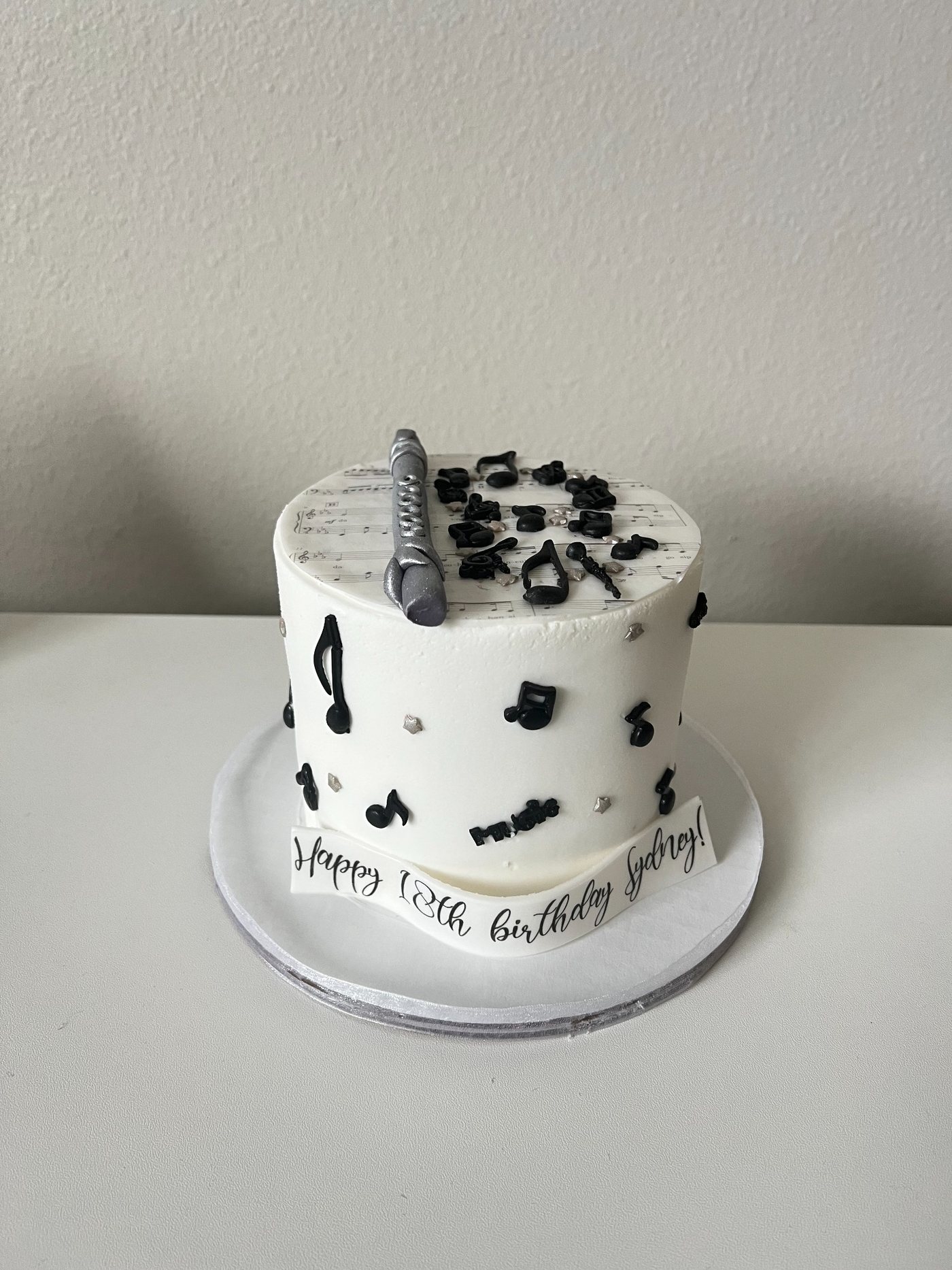Black and white music themed cake