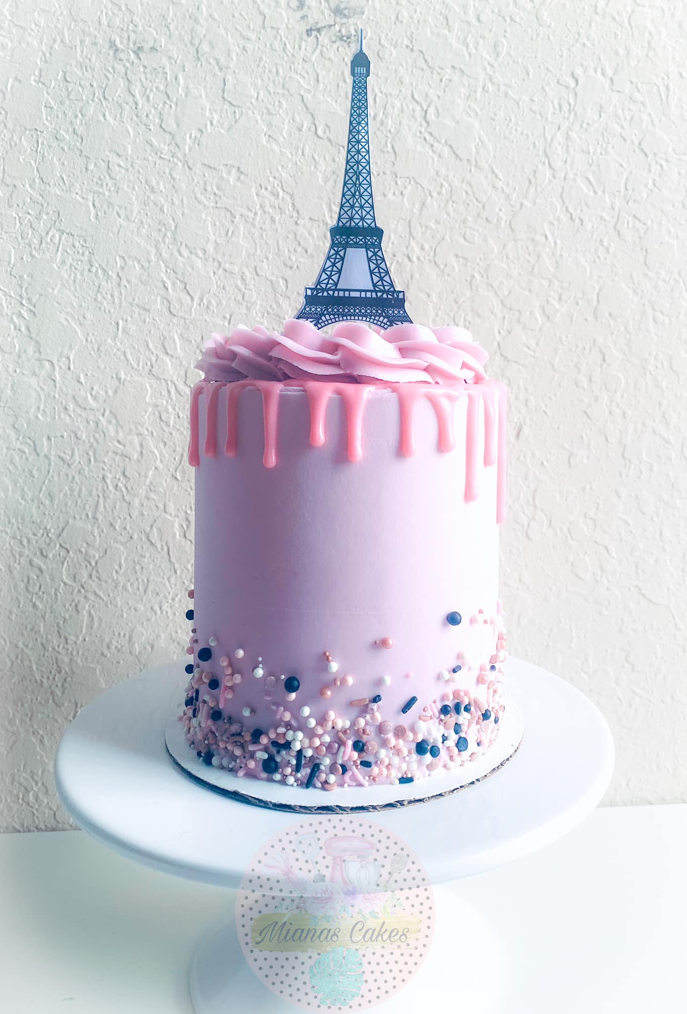Pink Paris themed drip cake