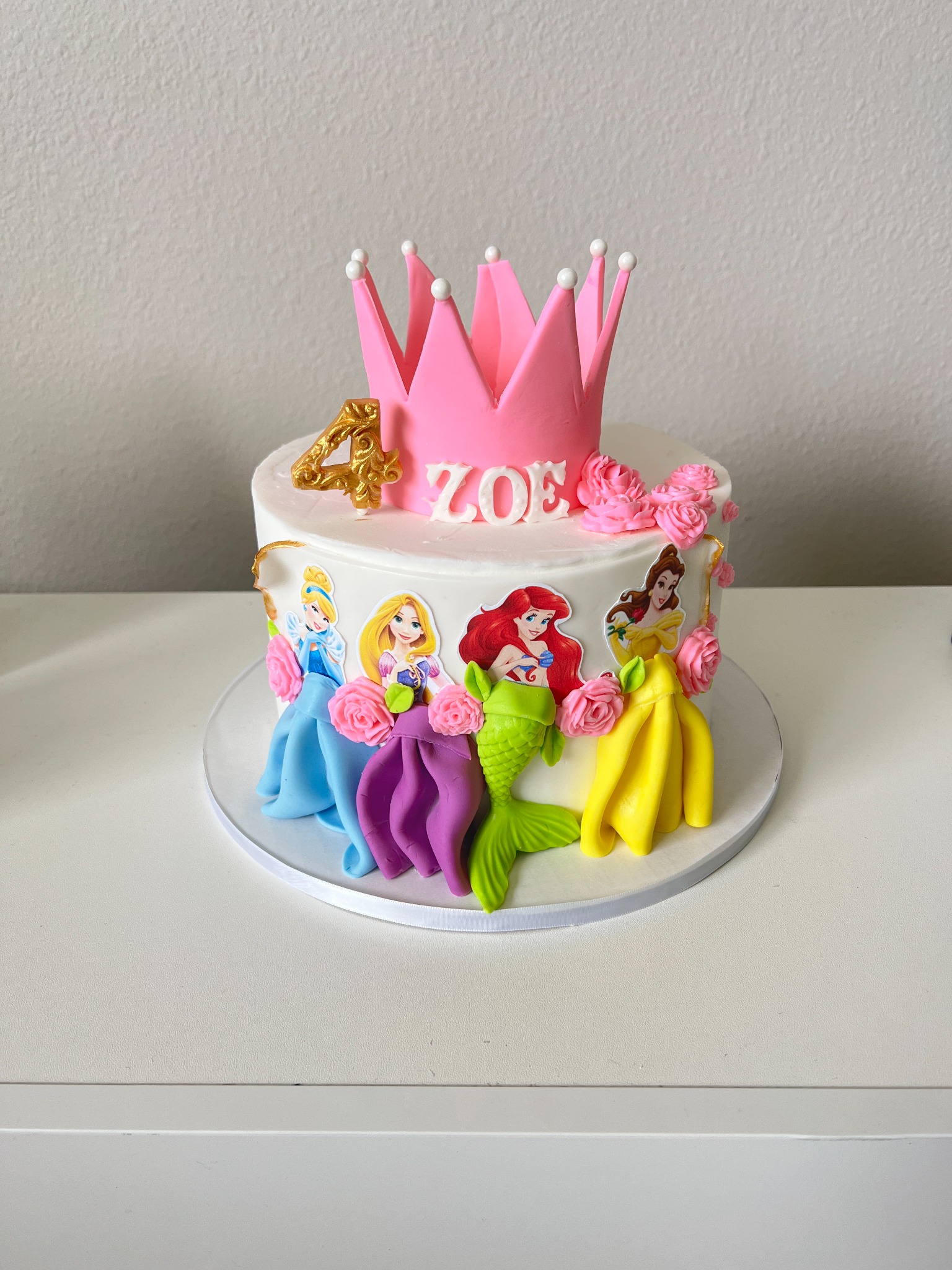 Princess crown cake with Disney princess details