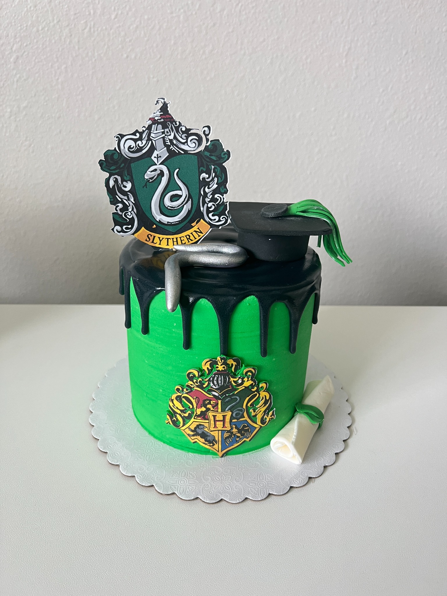 Slytherin themed graduation cake