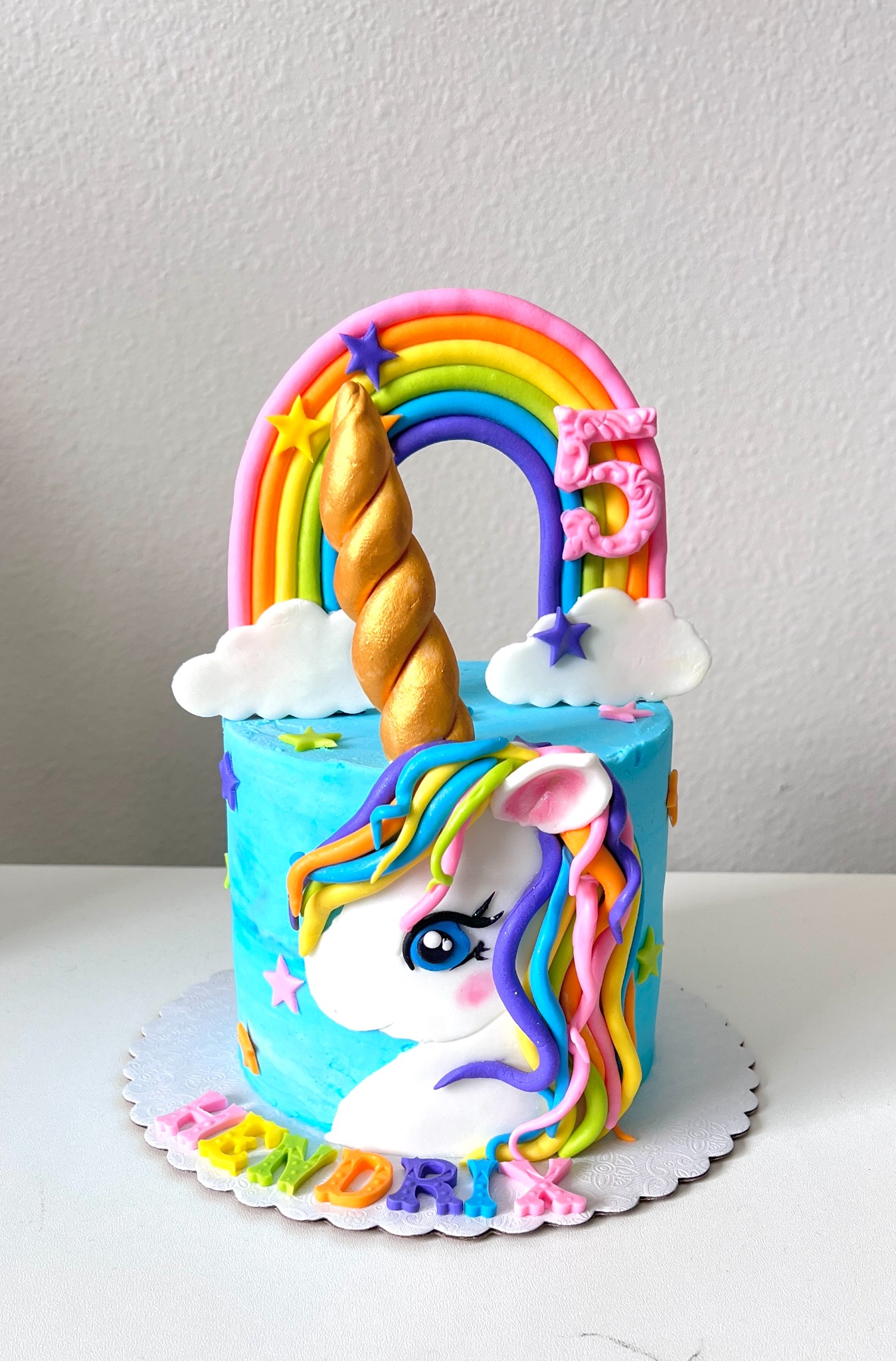 Blue rainbow unicorn cake